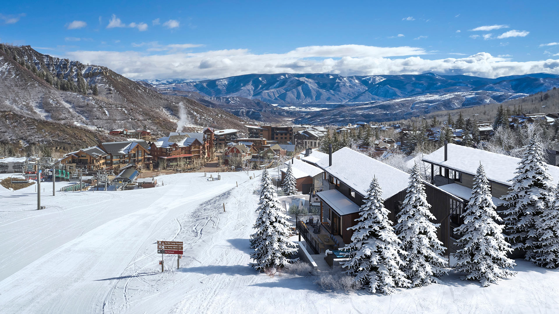 Architectural rendering of Snowmass Base Village at dusk in winter, Colorado